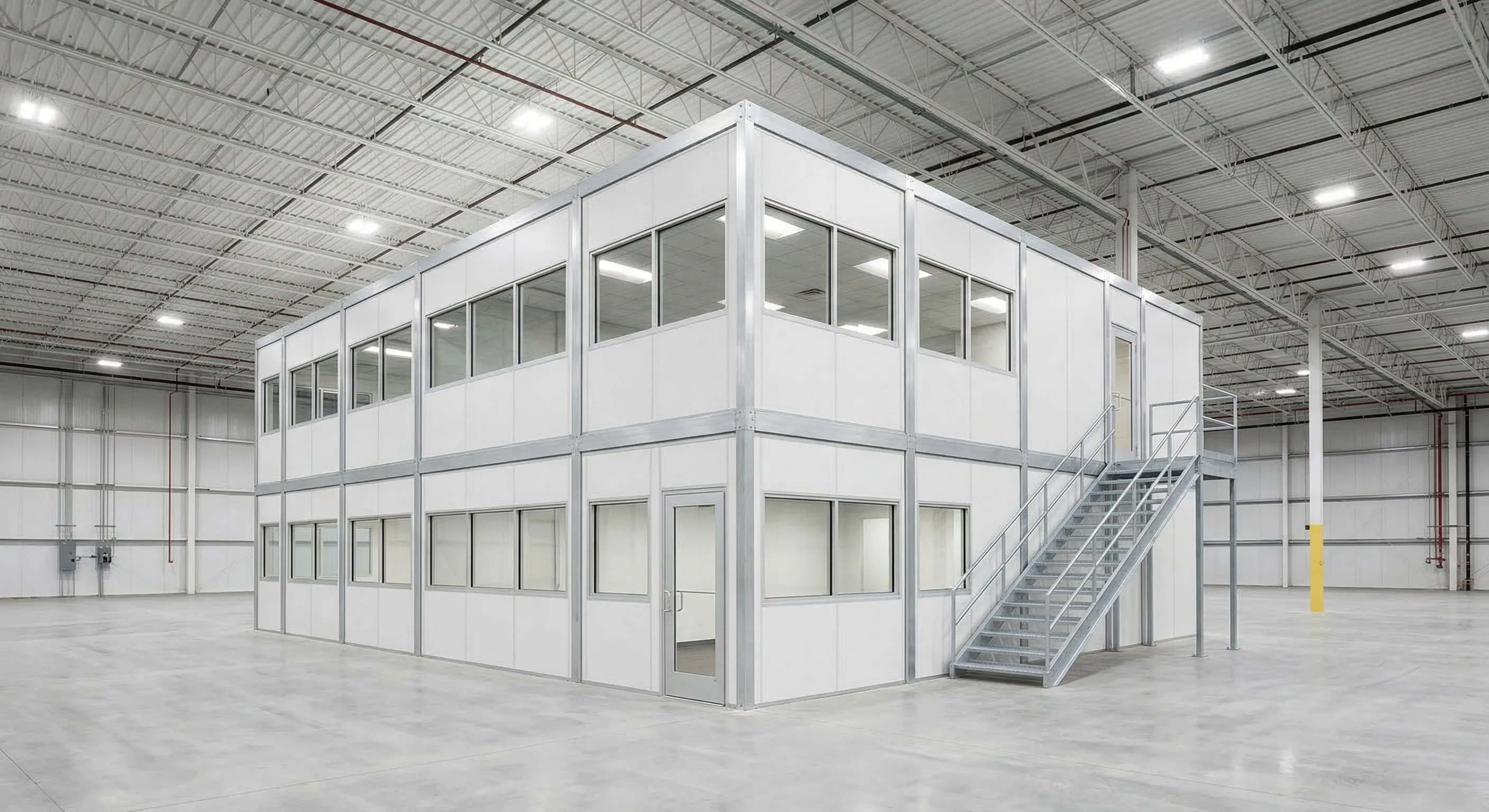 Two-story in-plant modular office with staircase installed inside a Baltimore area warehouse